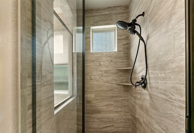 bathroom featuring an enclosed shower