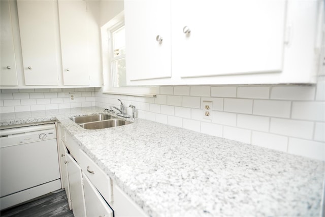 kitchen featuring dark wood-type flooring, white cabinetry, backsplash, and dishwasher