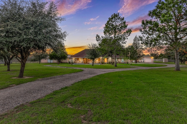 view of front of home featuring a lawn