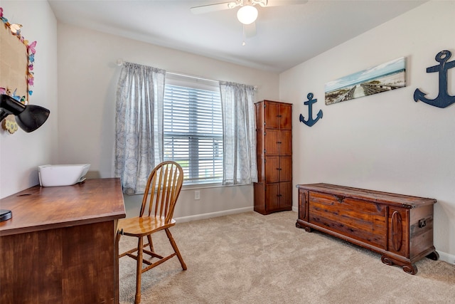 office with light colored carpet and ceiling fan