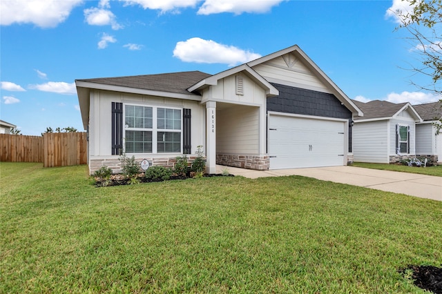 ranch-style home with a garage and a front yard