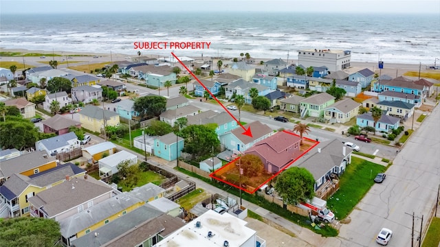 1324 Ursuline St, Galveston, TX 77550 - aerial view of residential area featuring property parcel outlined and a large body of water