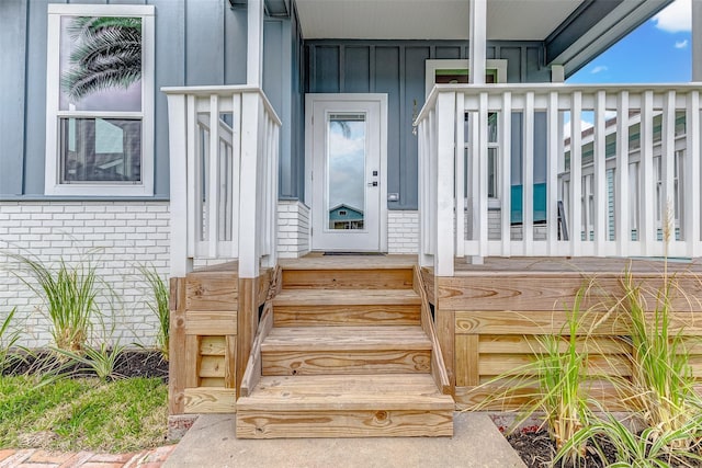 1324 Ursuline St, Galveston, TX 77550 - entrance to property with board and batten siding and brick siding