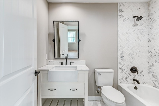 1324 Ursuline St, Galveston, TX 77550 - bathroom featuring toilet, vanity, shower / bathtub combination, and baseboards