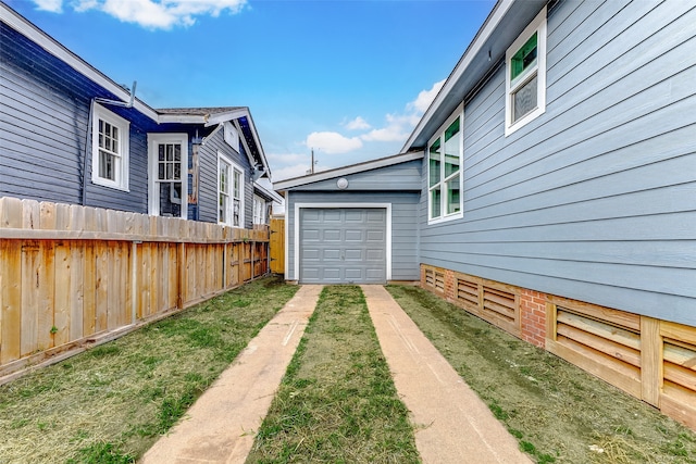 view of yard featuring a garage