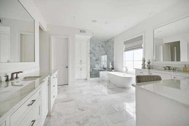 bathroom with plus walk in shower and vanity