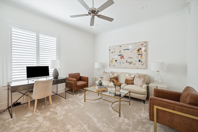 carpeted living room with ceiling fan and crown molding