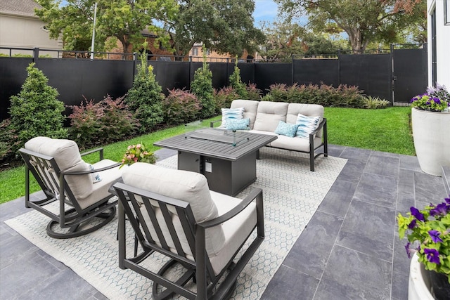 view of patio / terrace featuring an outdoor living space with a fire pit