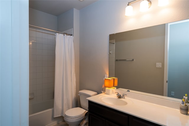 full bathroom with shower / tub combo with curtain, vanity, and toilet