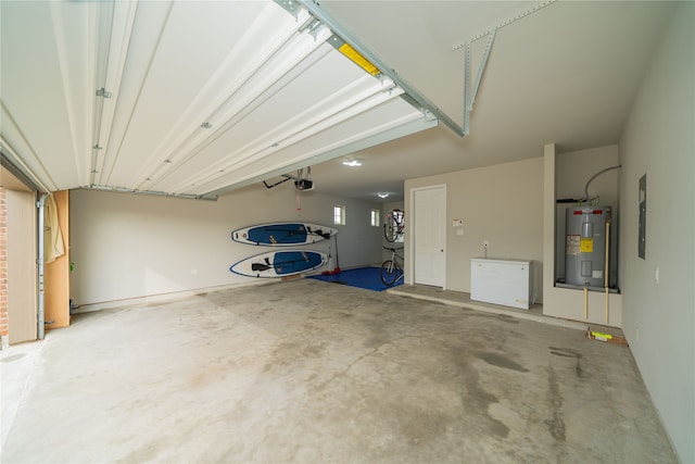 garage with electric panel, a garage door opener, water heater, and fridge