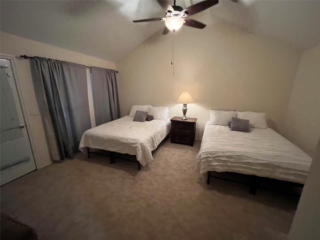 bedroom with ceiling fan, carpet flooring, and lofted ceiling