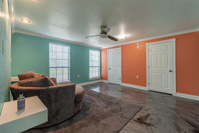 sitting room featuring crown molding, a textured ceiling, and ceiling fan