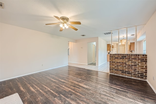 unfurnished room with wood-type flooring and ceiling fan