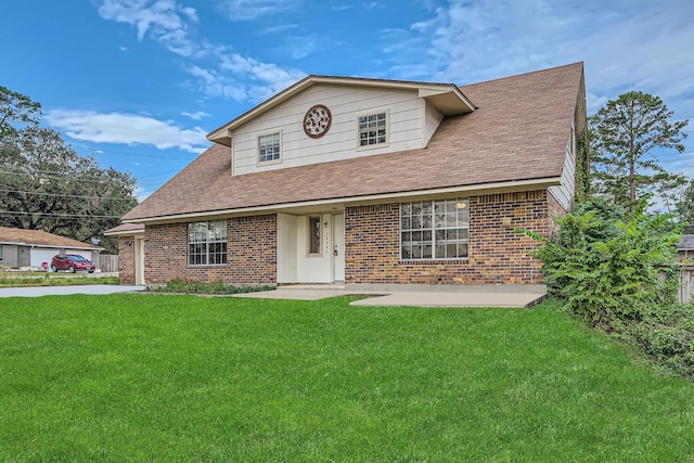 view of front of home with a front yard