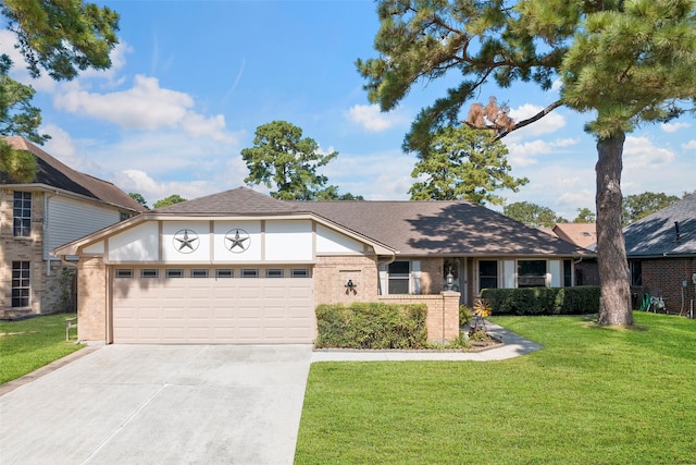 view of front of property with a garage and a front lawn