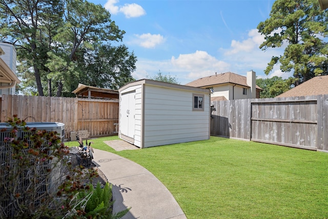 view of yard with a storage shed