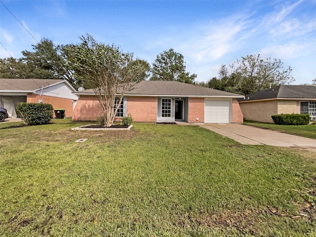 single story home with a garage and a front lawn