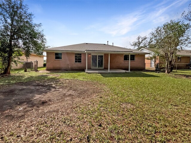 8719 Noble St, Needville, TX 77461 - rear view of property featuring a patio