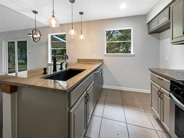 8719 Noble St, Needville, TX 77461 - kitchen featuring a sink, stainless steel appliances, gray cabinetry, a peninsula, and recessed lighting
