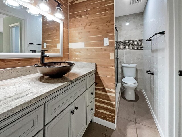 8719 Noble St, Needville, TX 77461 - bathroom with tile patterned flooring, vanity, and toilet