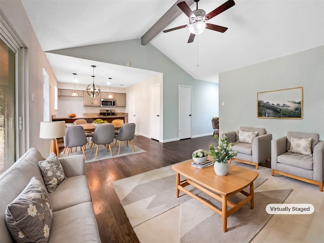 living room featuring lofted ceiling with beams, wood-type flooring, and ceiling fan