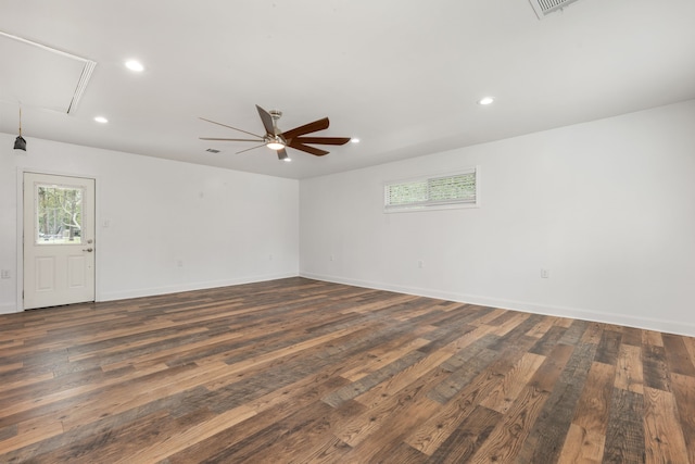 unfurnished room featuring dark hardwood / wood-style floors and ceiling fan