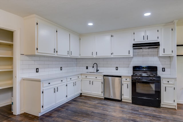 kitchen with dark wood-type flooring, dishwasher, sink, black range with gas cooktop, and white cabinetry