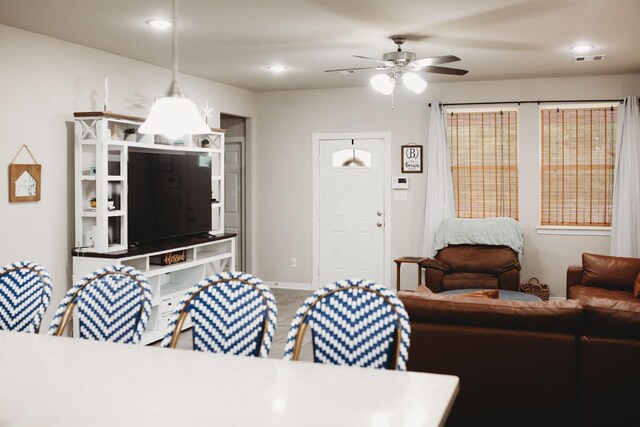 living room with ceiling fan