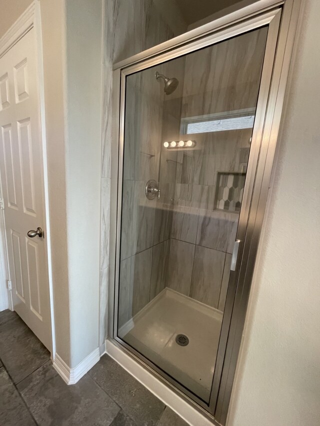 bathroom with an enclosed shower