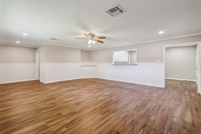 unfurnished living room with ceiling fan, wood-type flooring, and ornamental molding