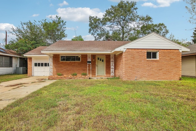 single story home with central AC unit, a garage, and a front lawn