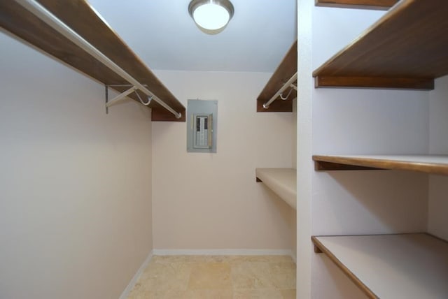 walk in closet featuring electric panel