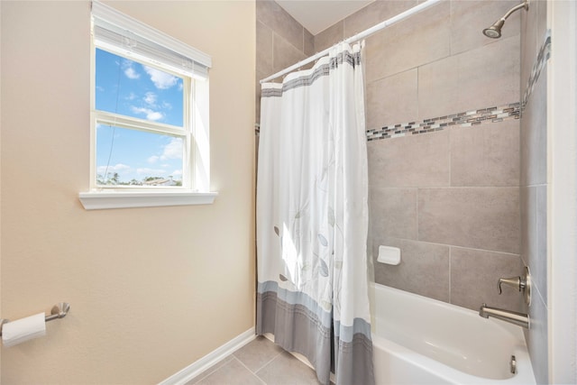 bathroom with tile patterned flooring and shower / bathtub combination with curtain