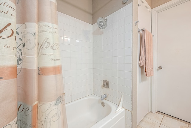 bathroom with tile patterned flooring and shower / bath combo with shower curtain