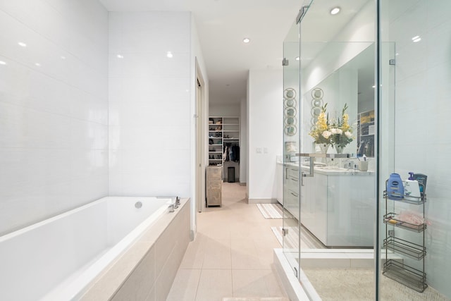 bathroom with vanity, tile patterned floors, and separate shower and tub