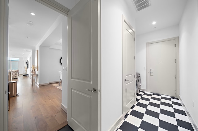 hallway with light wood-type flooring