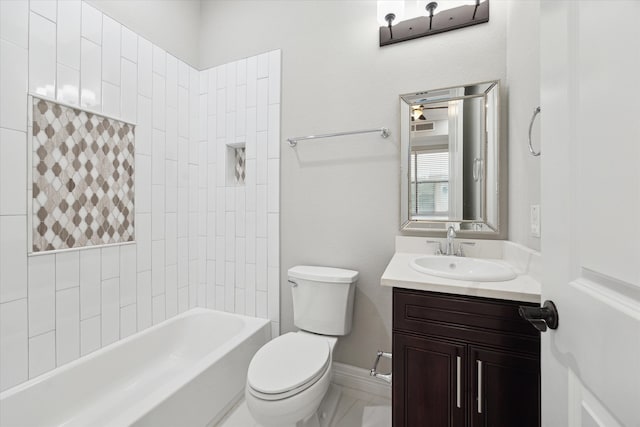 full bathroom with vanity, toilet, and tiled shower / bath