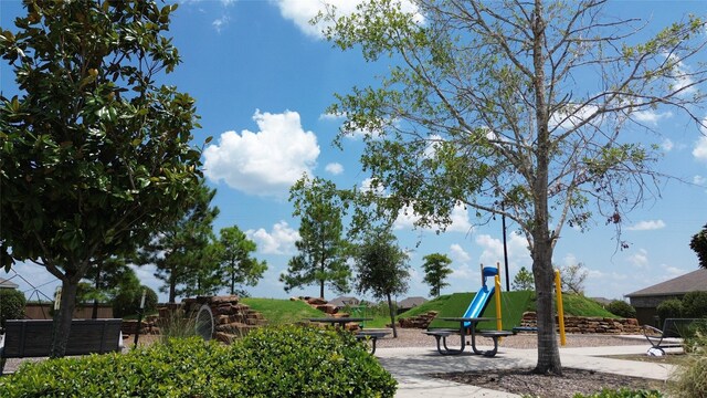 surrounding community featuring a playground