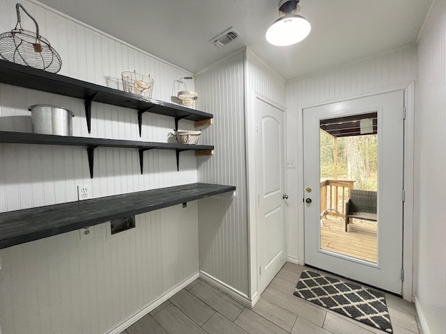 doorway to outside with light hardwood / wood-style floors