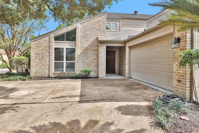 front of property featuring a garage