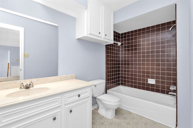 full bathroom with vanity, toilet, and tiled shower / bath combo