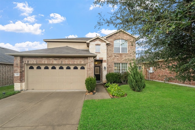 view of property with a front lawn and a garage