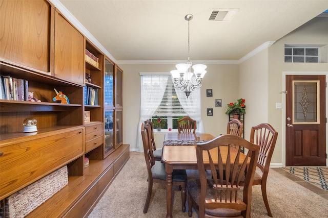 dining space with light carpet, crown molding, and an inviting chandelier