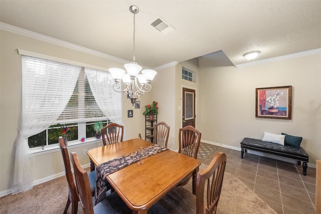 tiled dining area featuring a chandelier, a textured ceiling, and ornamental molding