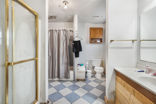 full bathroom with toilet, a textured ceiling, vanity, and shower / tub combo with curtain