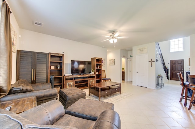 8438 Sunset Isles Dr, Baytown, TX 77521 - living area featuring stairway and a ceiling fan