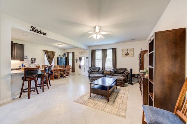 8438 Sunset Isles Dr, Baytown, TX 77521 - living room featuring a ceiling fan