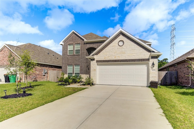 8438 Sunset Isles Dr, Baytown, TX 77521 - view of front of house with concrete driveway, an attached garage, brick siding, stone siding, and roof with shingles