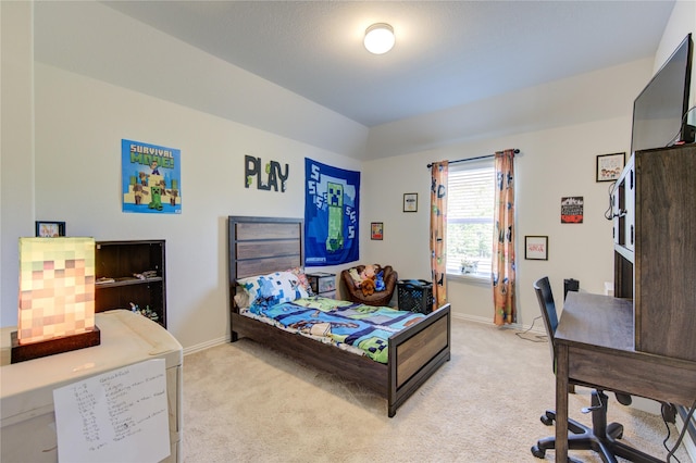 8438 Sunset Isles Dr, Baytown, TX 77521 - bedroom with light carpet, baseboards, and an office area