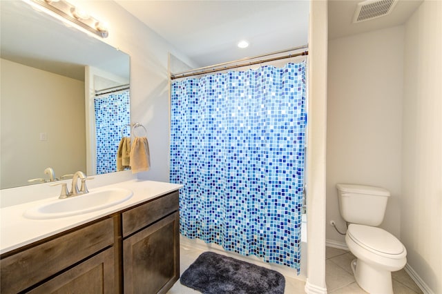 8438 Sunset Isles Dr, Baytown, TX 77521 - full bath with toilet, vanity, tile patterned flooring, and curtained shower